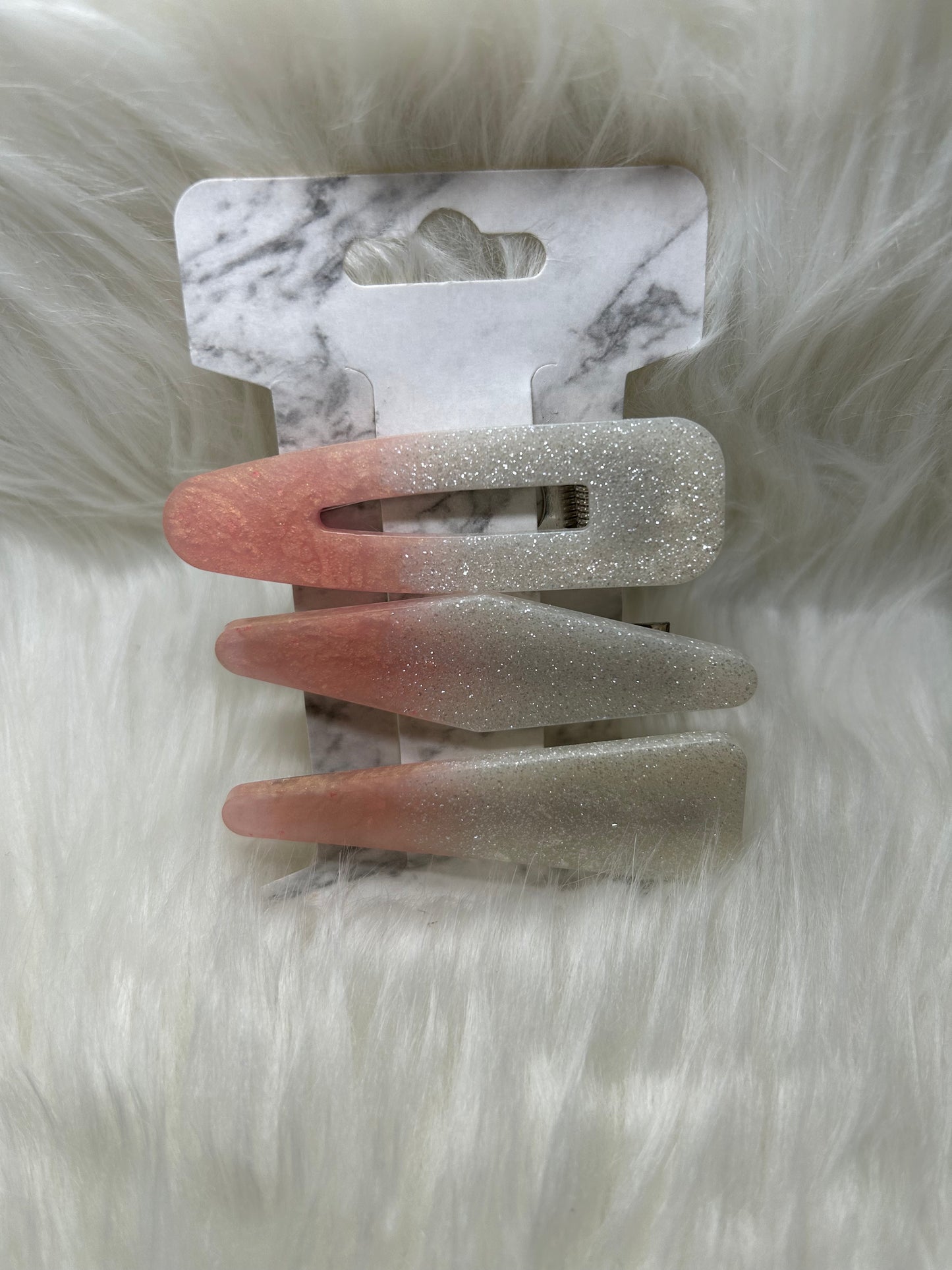 Pink and white barrettes