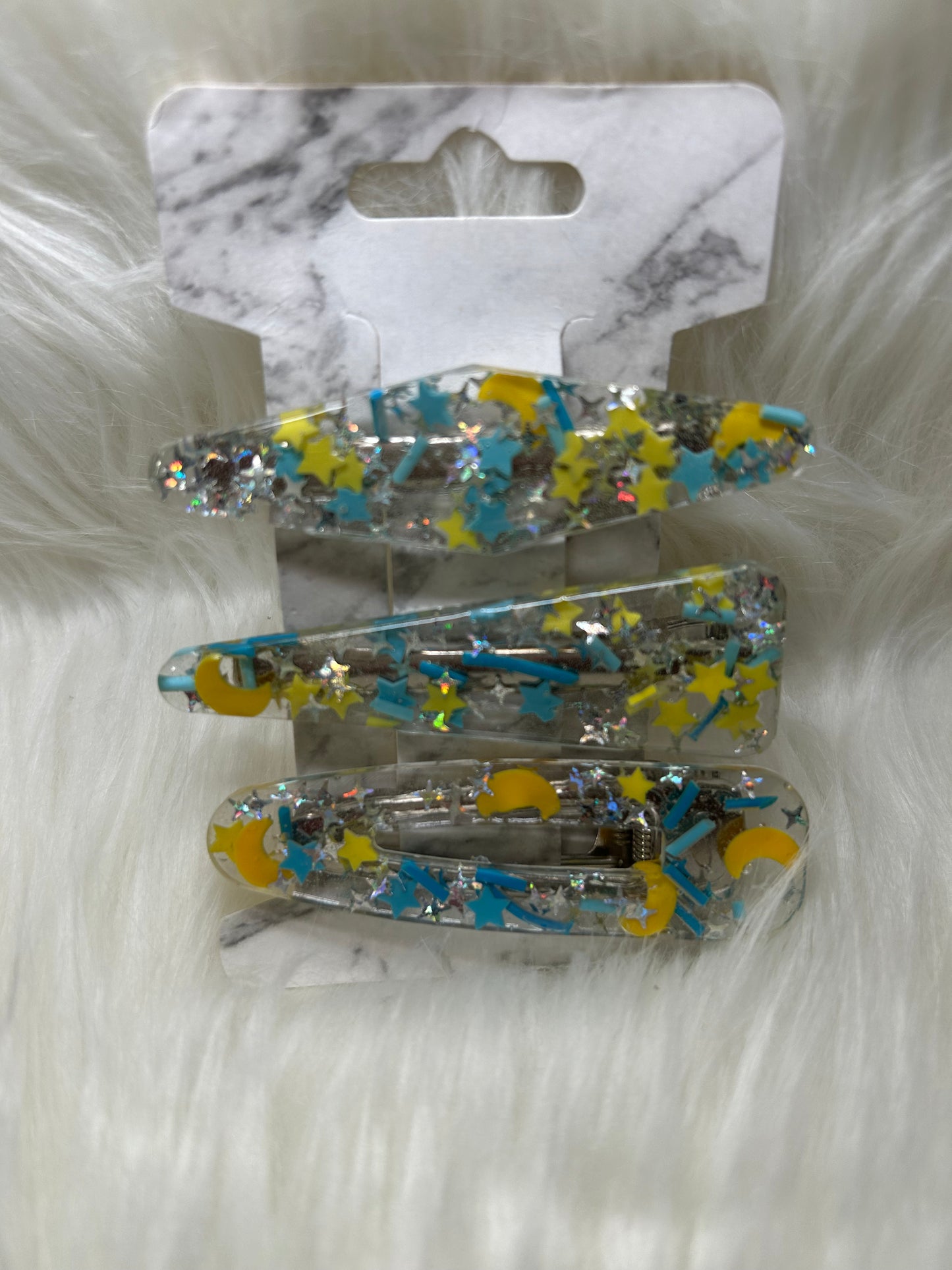 Blue and yellow barrettes