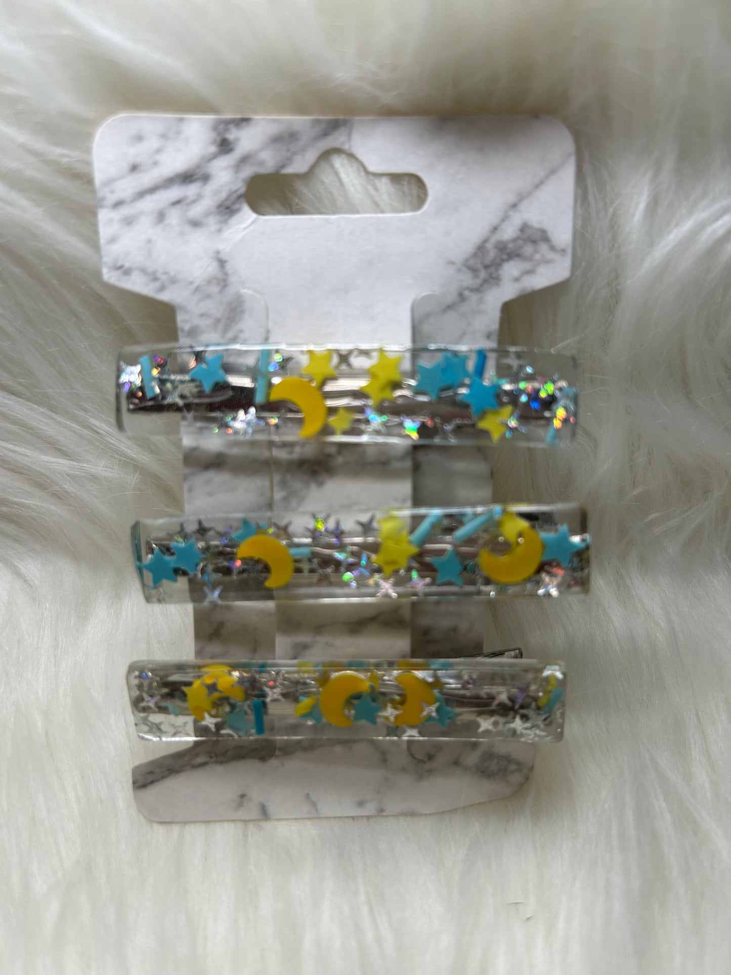 Blue and yellow barrettes