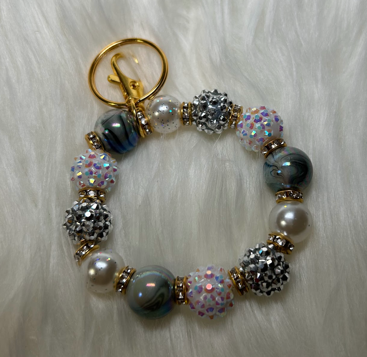 Silver and white wristlet keychain