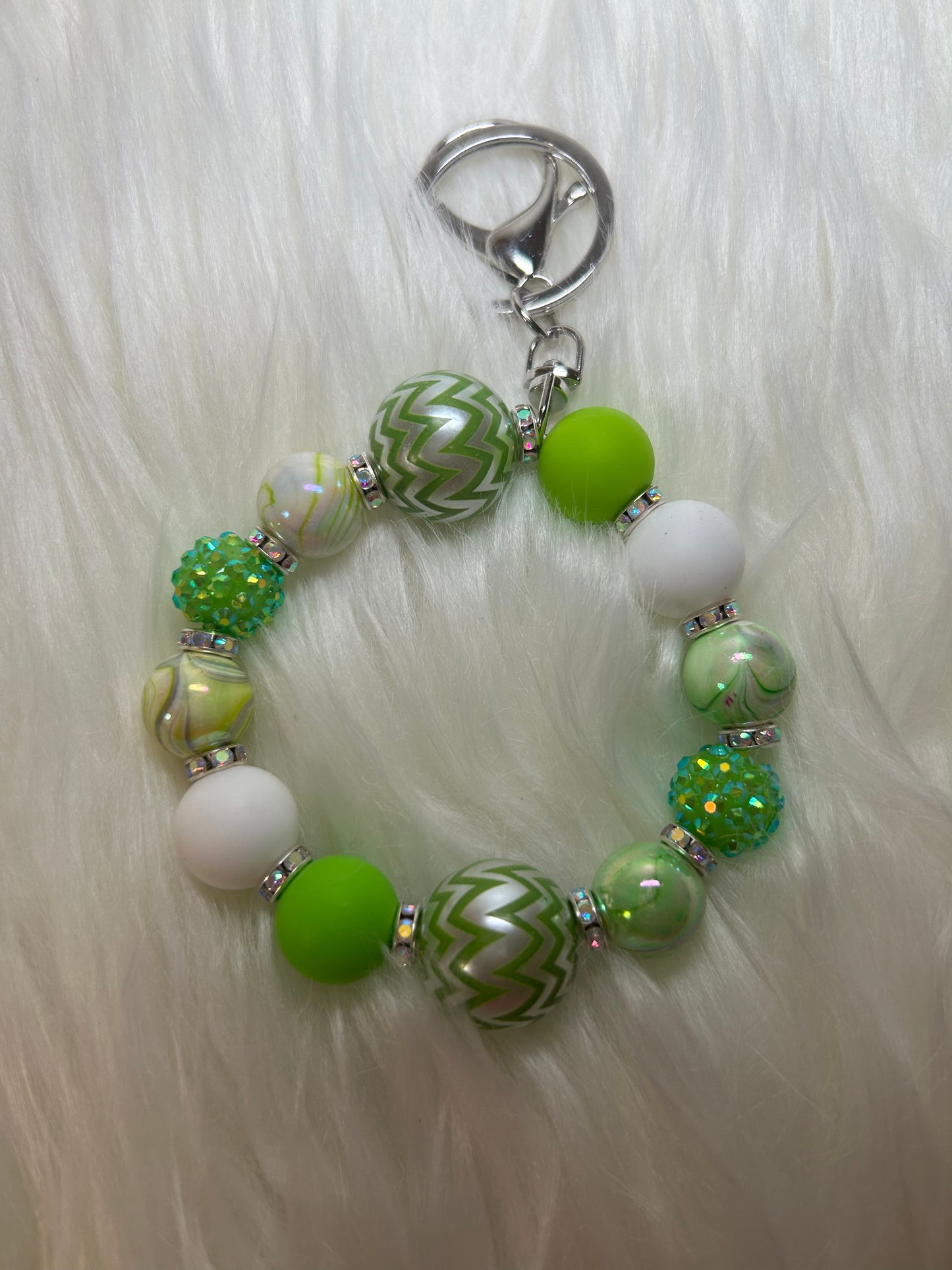 Green and white wristlet keychain