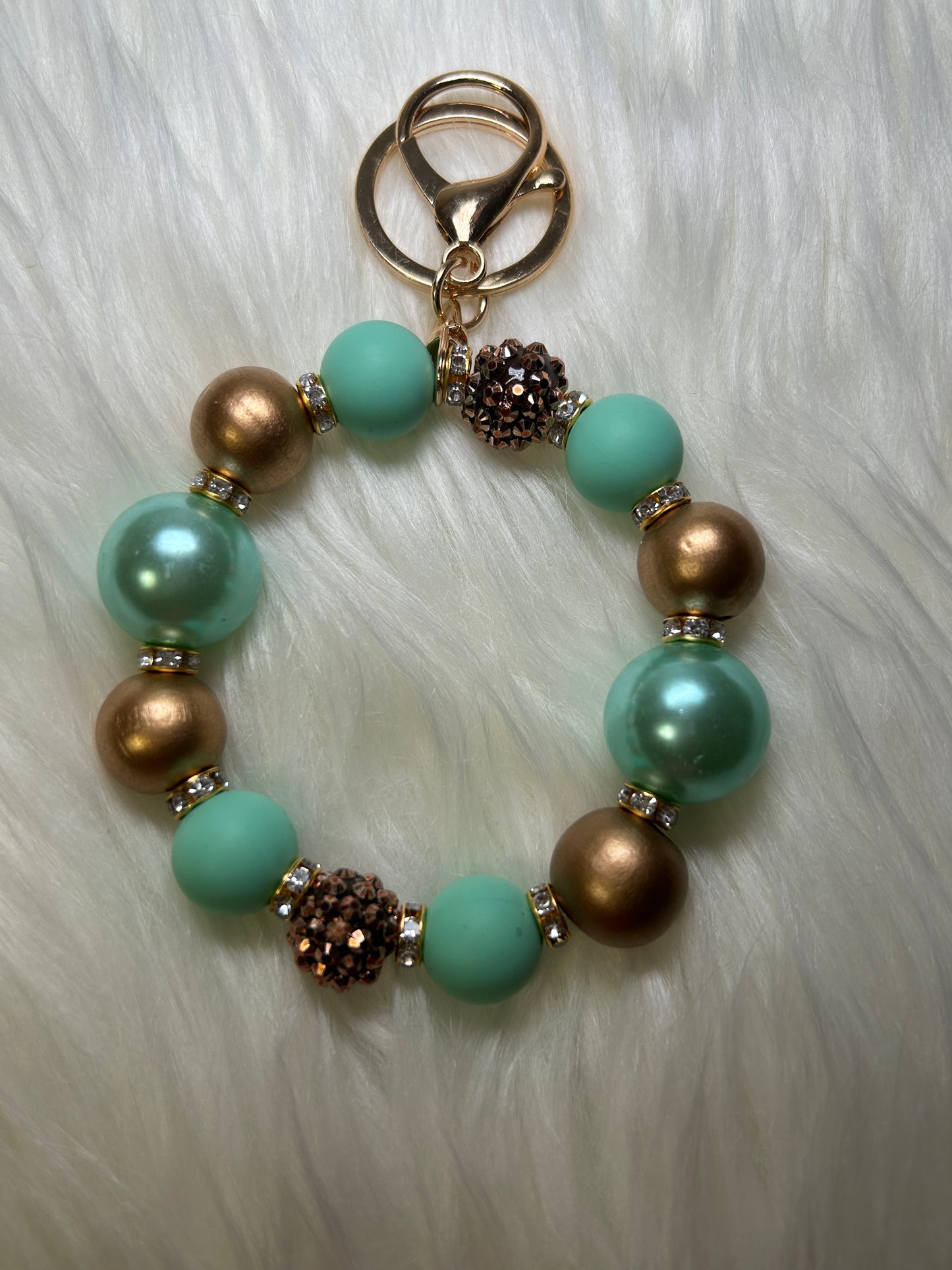 Mint green and gold wristlet keychain