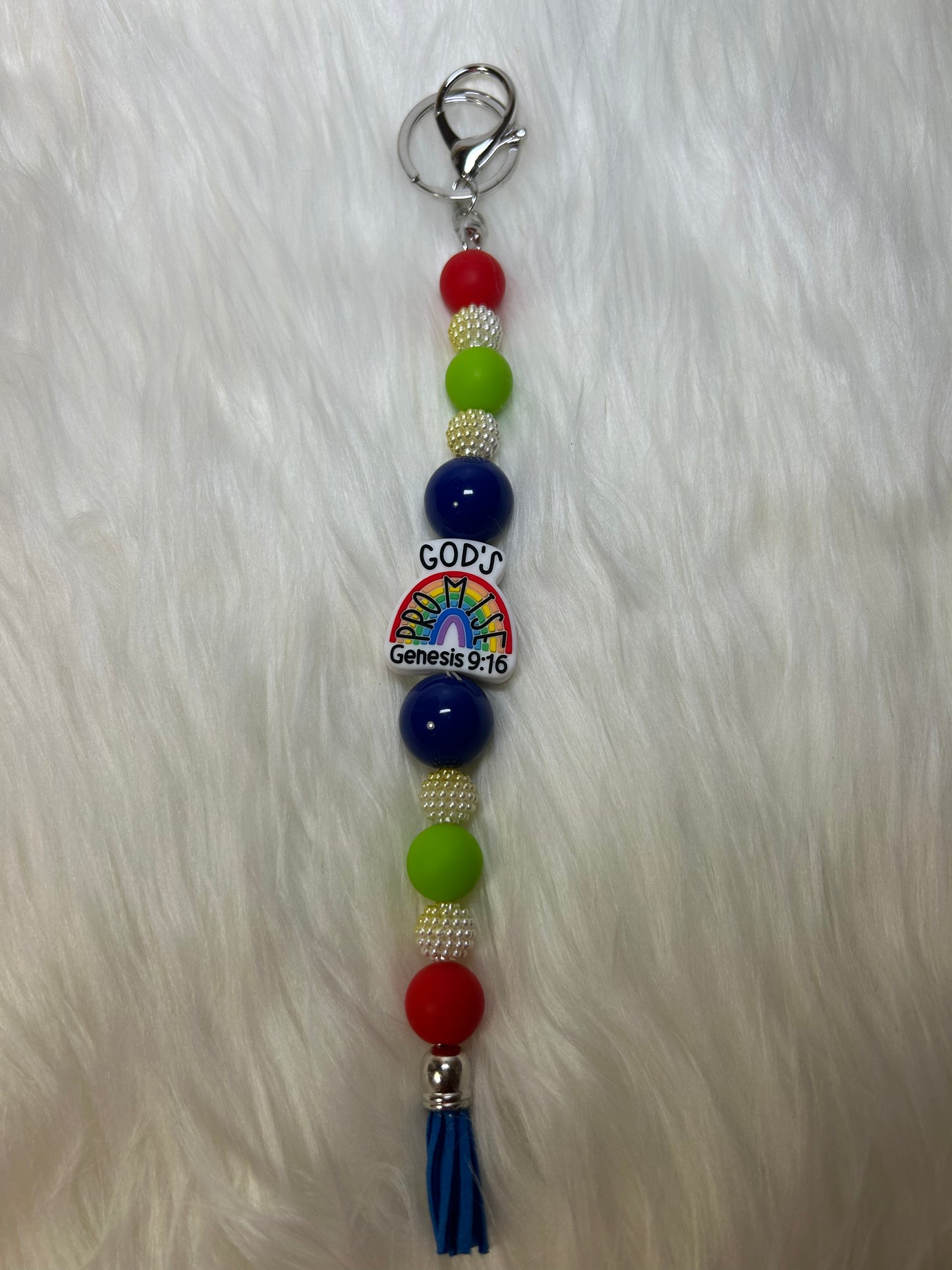 Red, green, and blue religious keychain