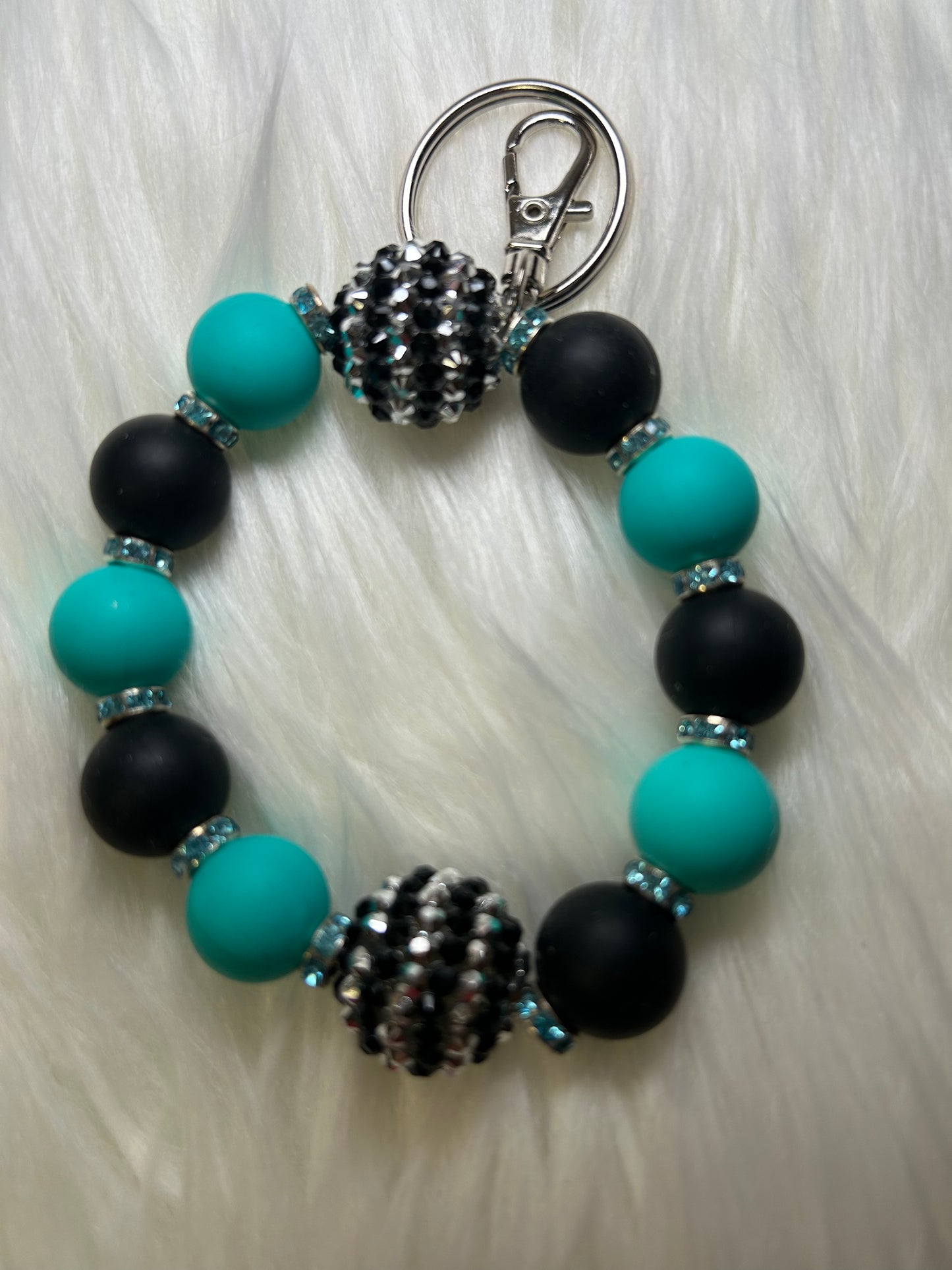 Teal and black wristlet keychain