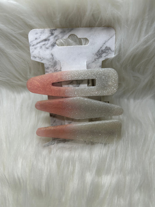 Pink and white barrettes