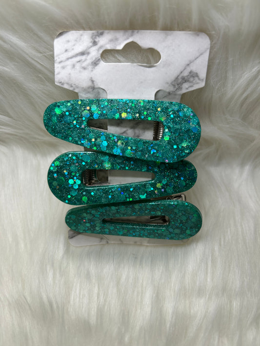 Green glitter barrettes