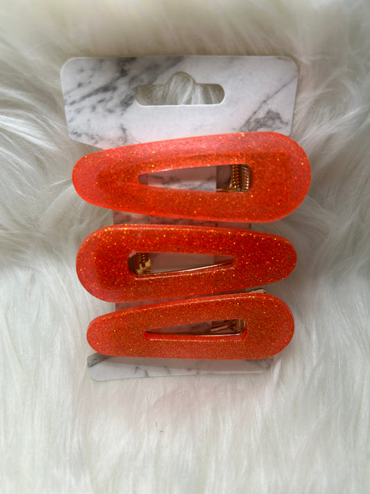 Orange barrettes