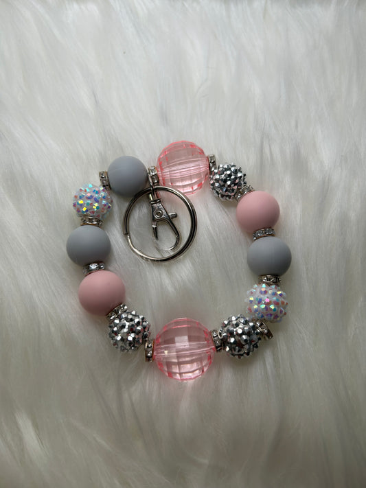 Gray and pink wristlet