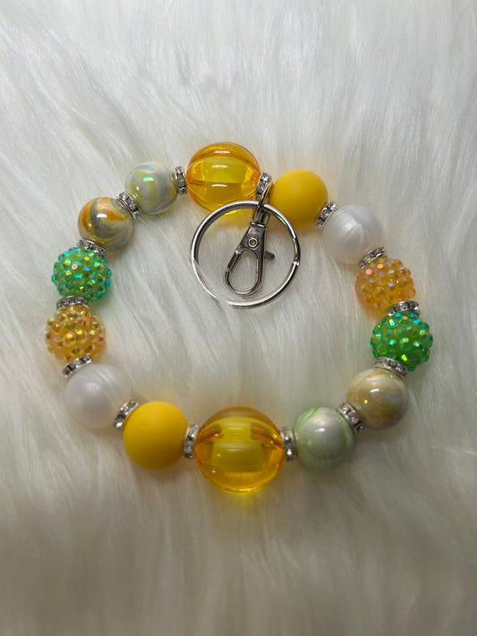 Yello, green, and white wristlet