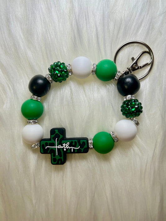Green, black, and white wristlet keychain
