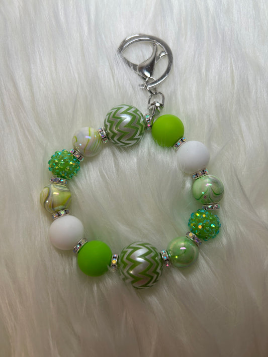 Green and white wristlet keychain