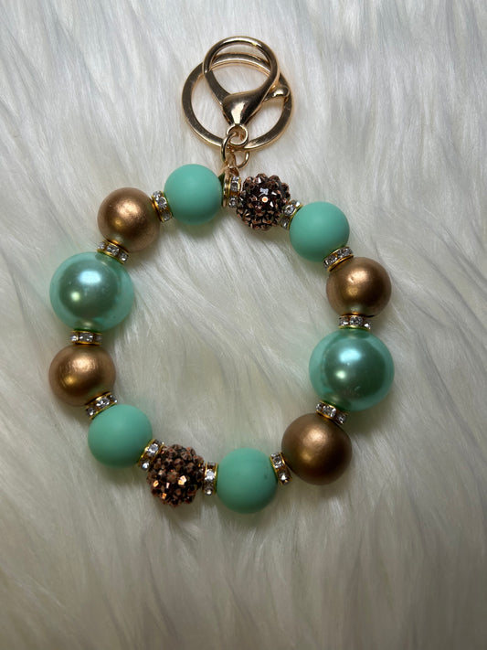 Mint green and gold wristlet keychain