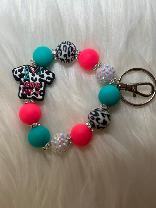 Pink, blue, nursing wristlet keychain