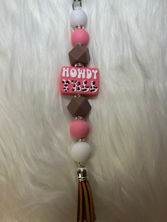 Pink, brown, and white keychain