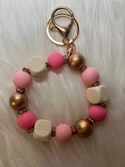 Pink and gold wristlet keychain