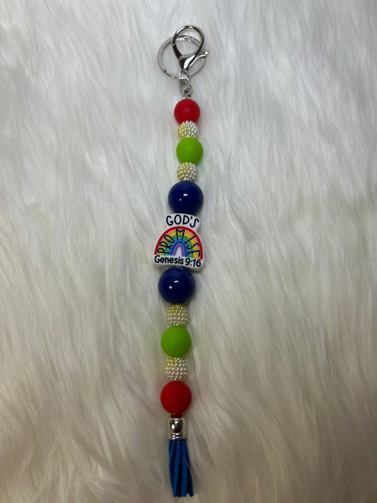 Red, green, and blue religious keychain